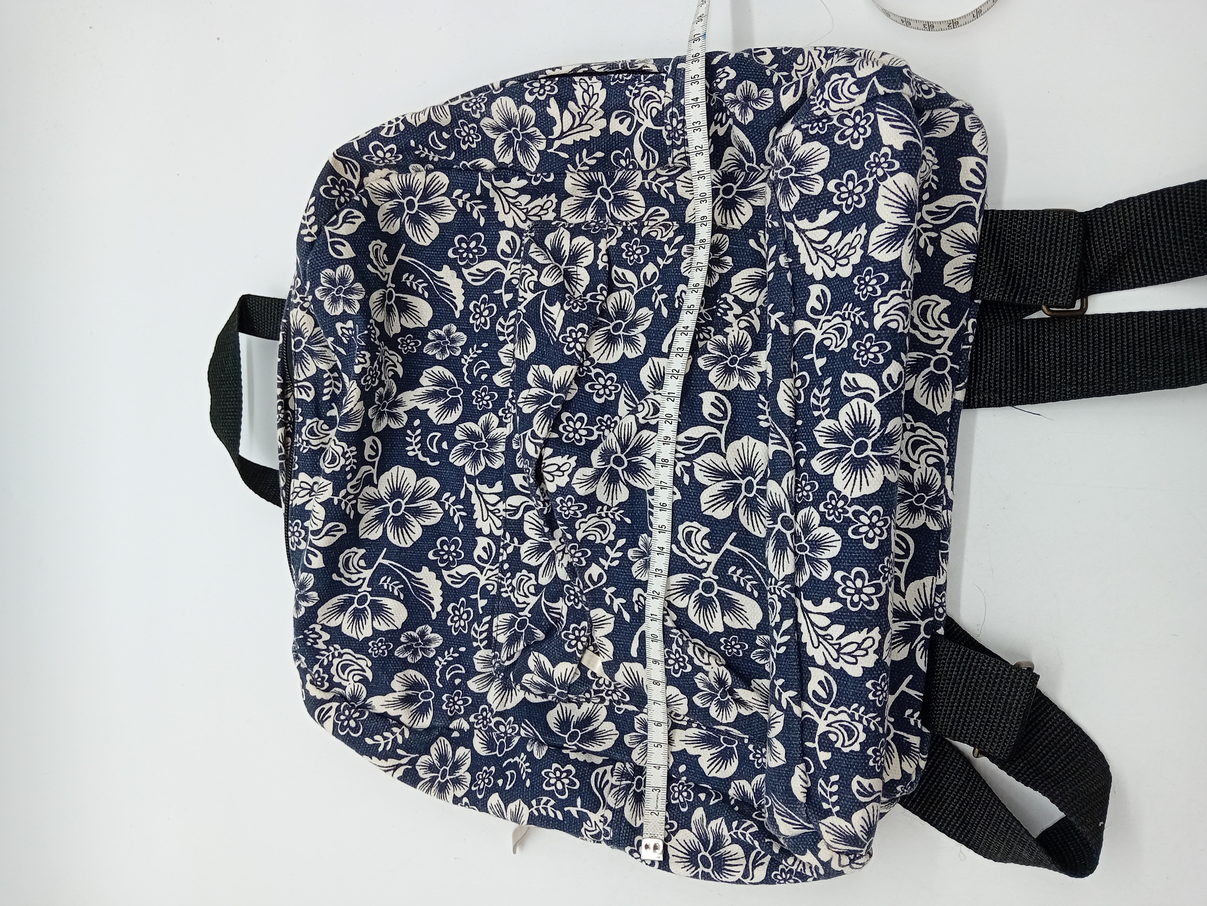 Sac à dos bleu à motifs fleurs