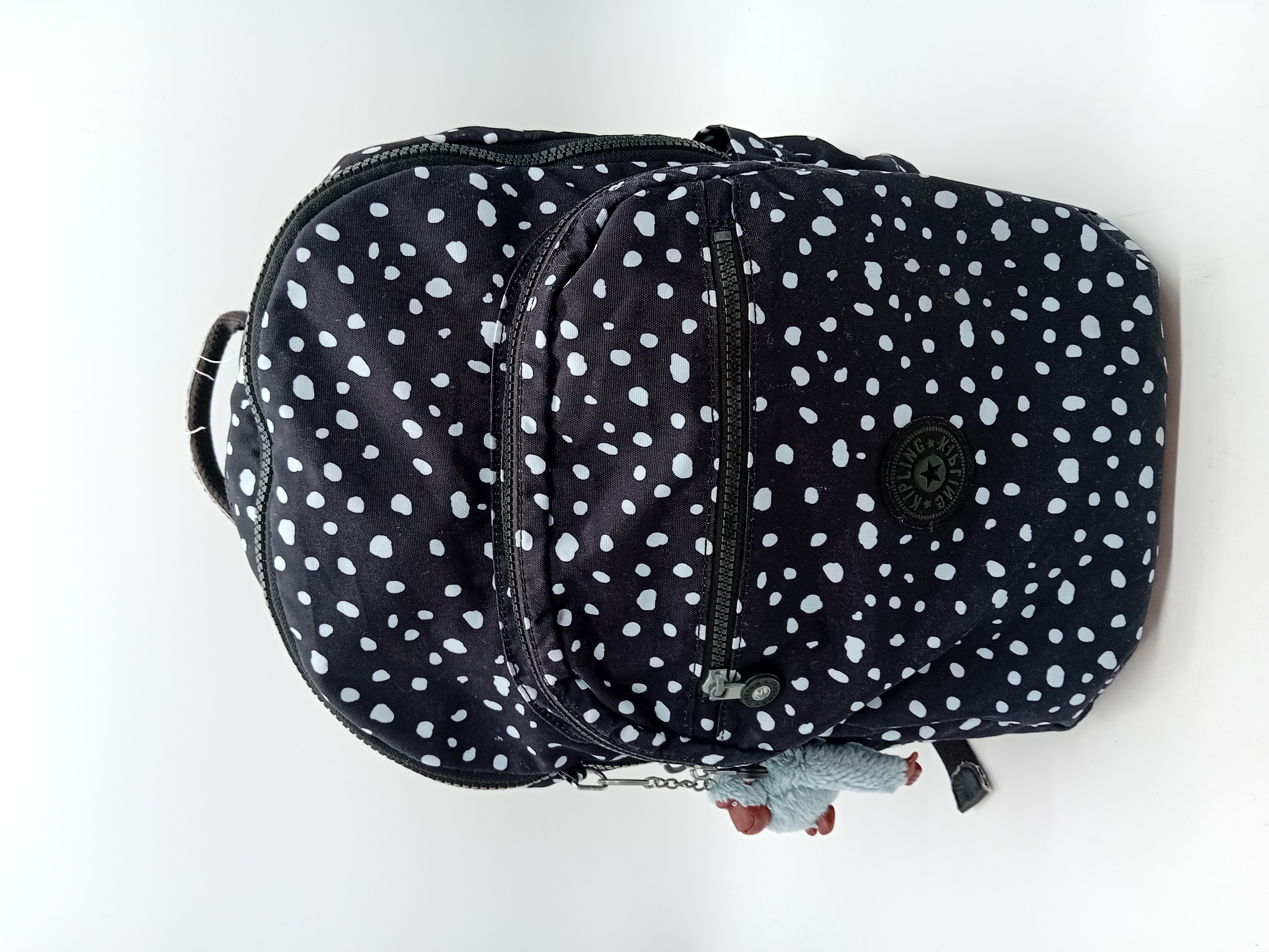 Sac à dos Kipling à pois noirs et blancs