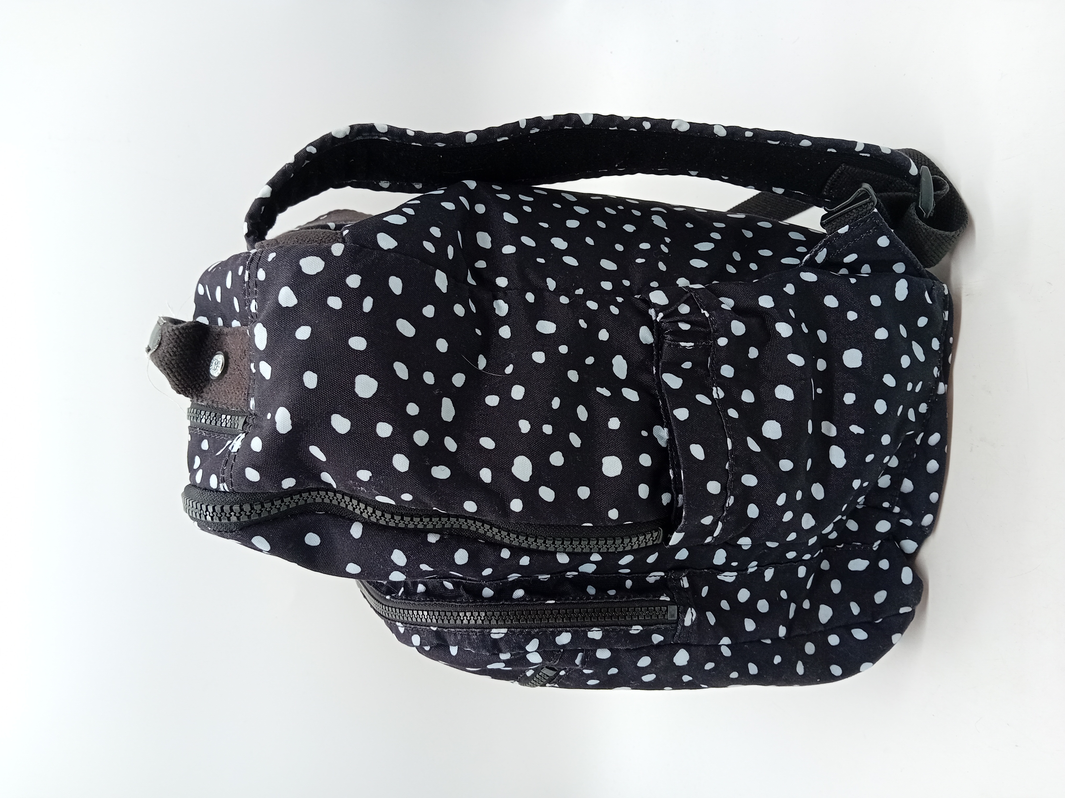 Sac à dos Kipling à pois noirs et blancs