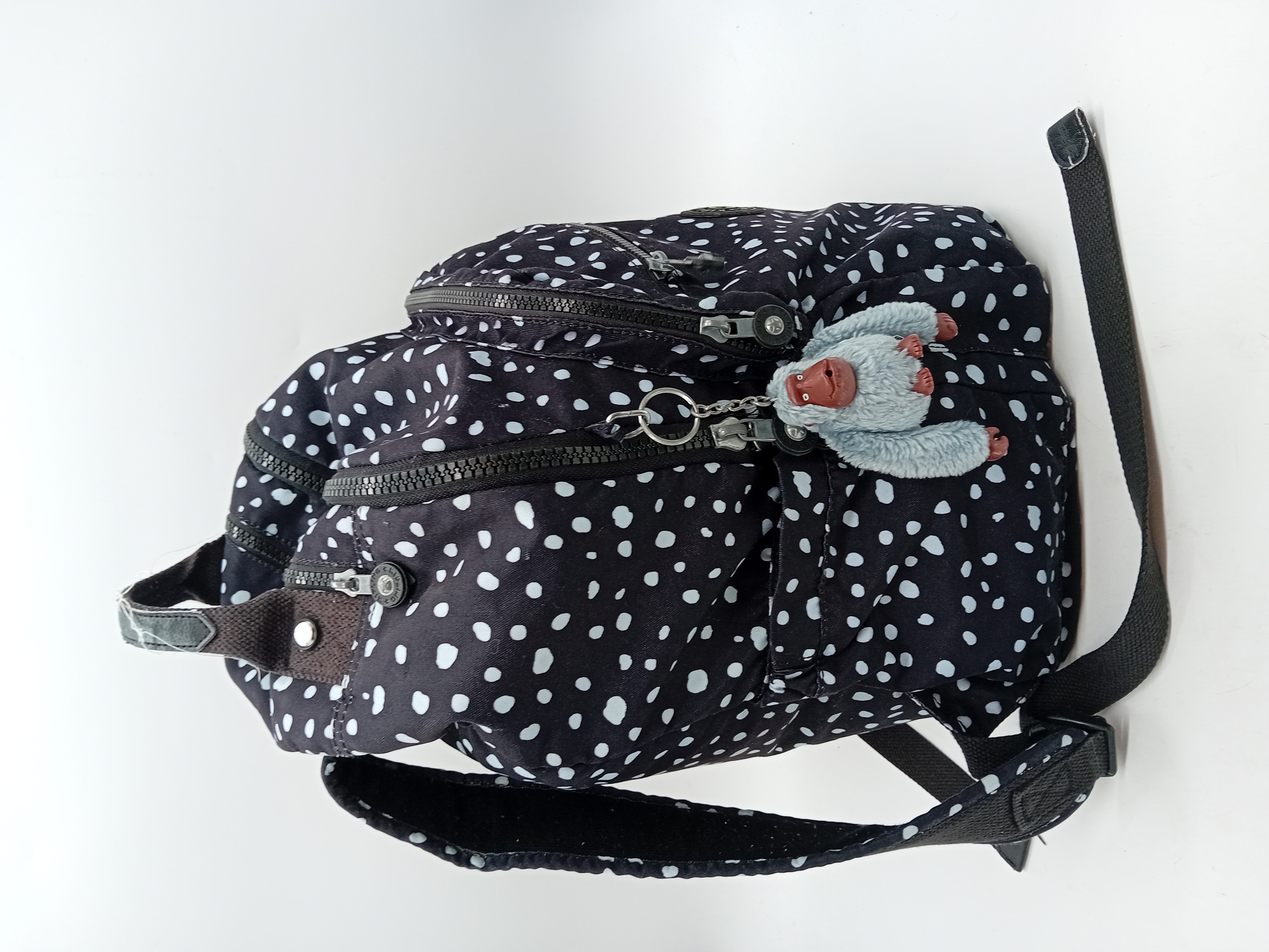 Sac à dos Kipling à pois noirs et blancs