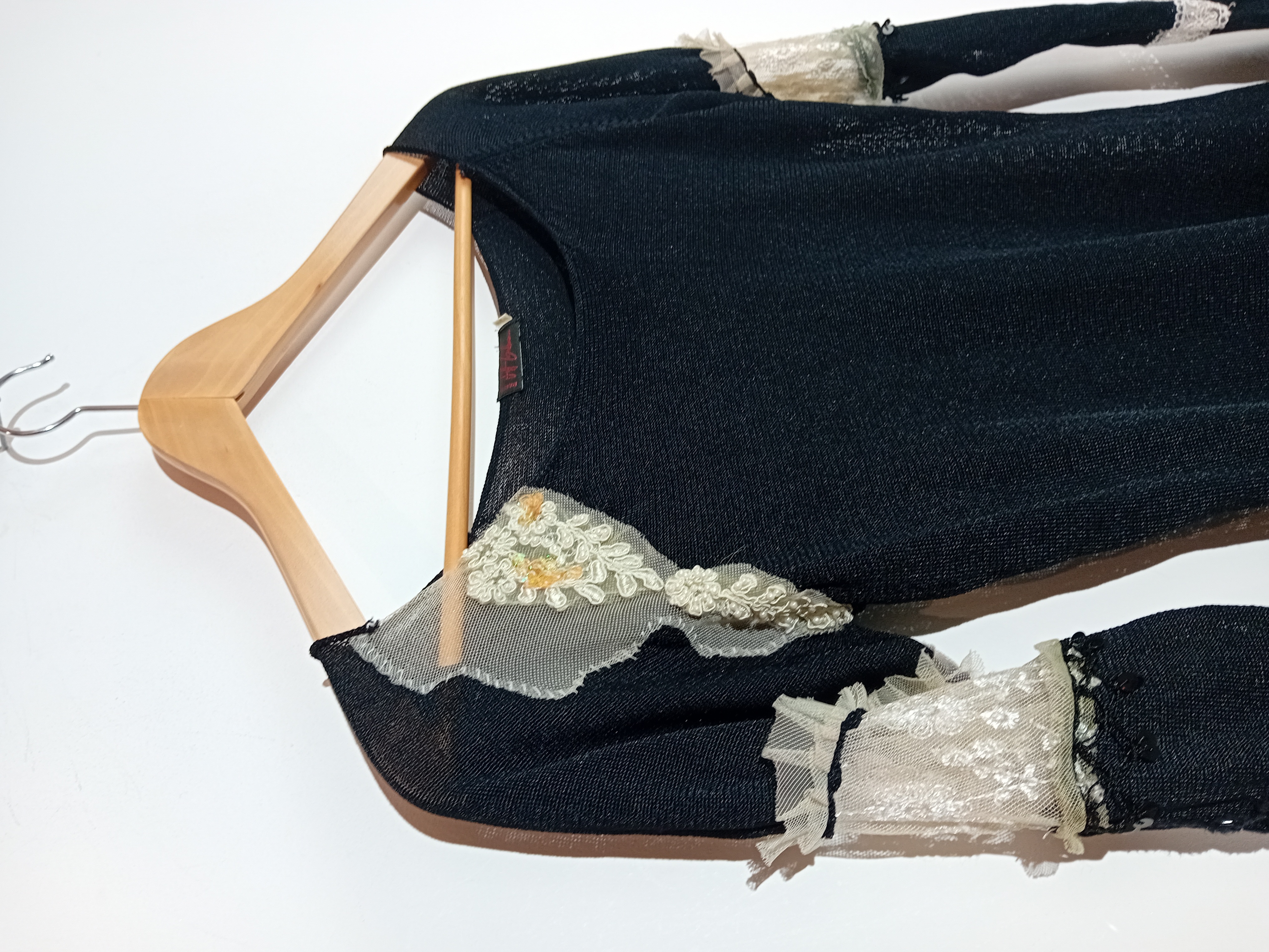 Top en maille noire avec dentelle Jeff Gallano