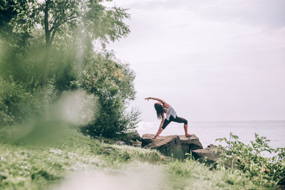 Outdoor pilates class by the sea