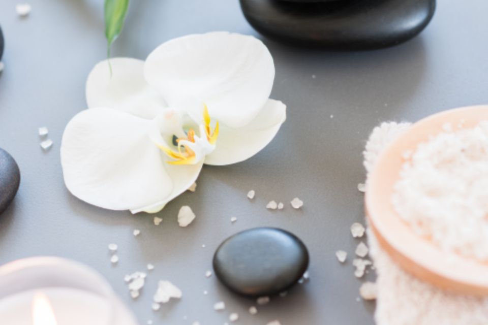 Relaxing reflexology with hot stones